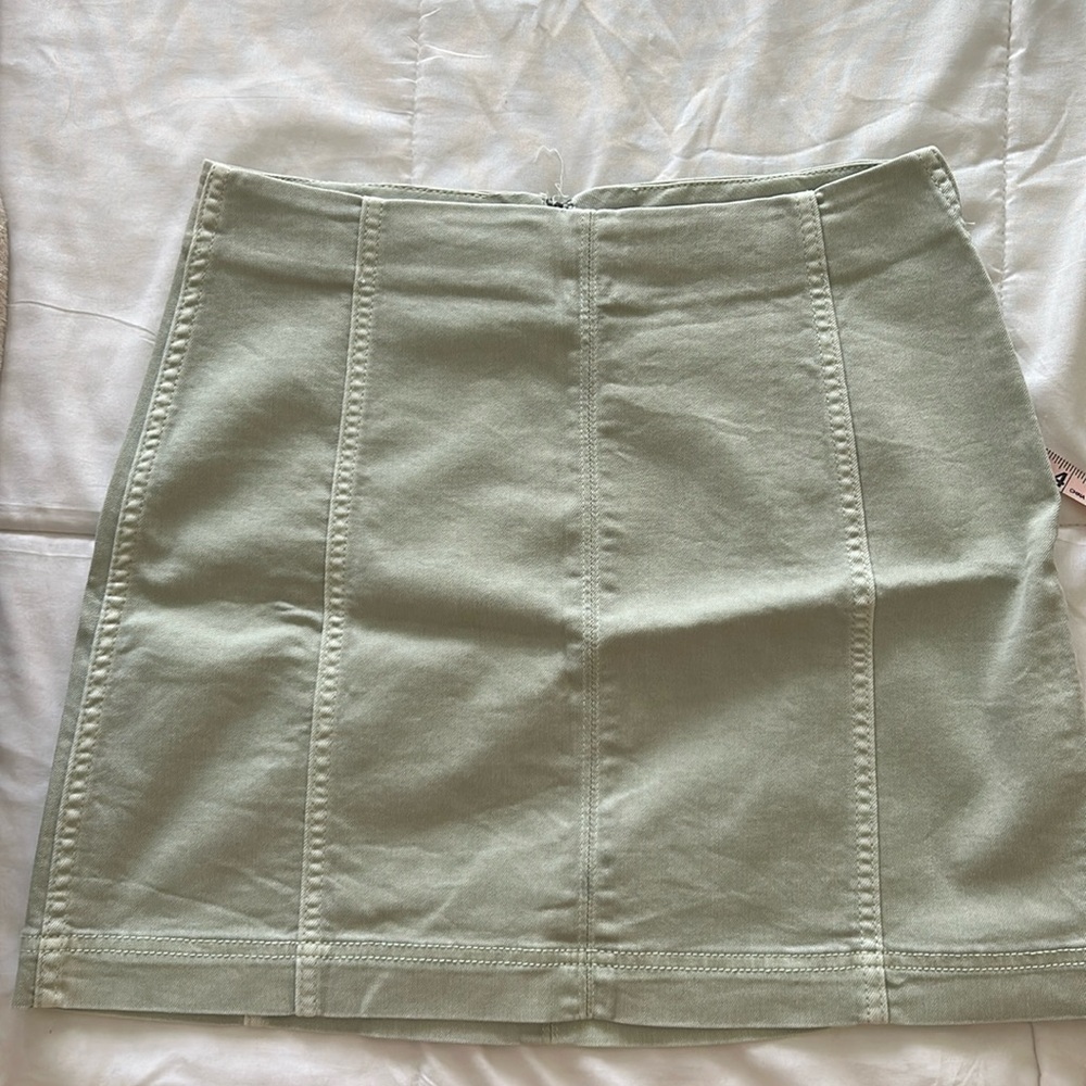 Pale green denim mini